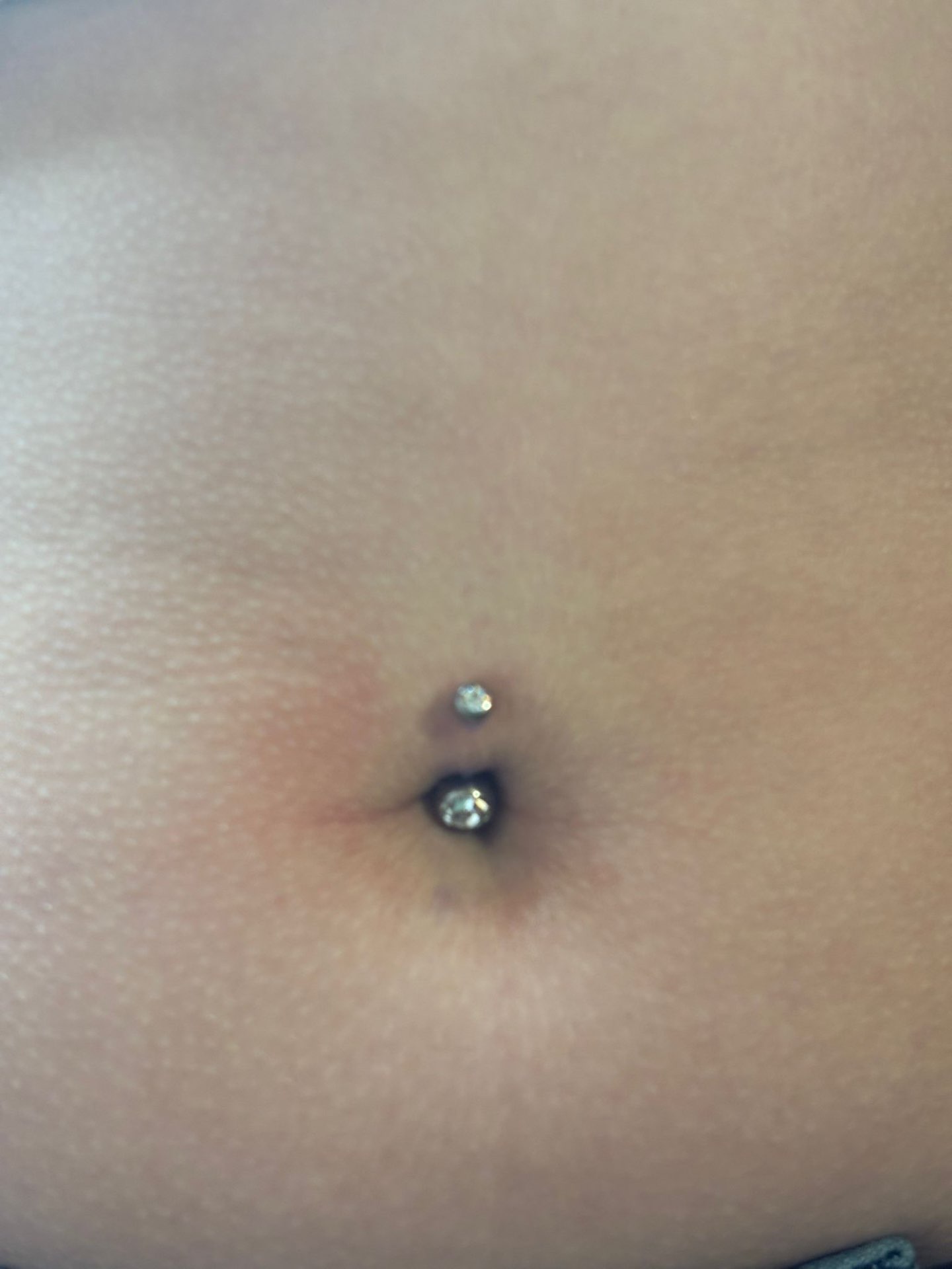 Navelpiercing met steentjes